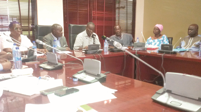  Mr Kosi Kedem (middle), President of the Forum of Former Members of Parliament (FFMP), addressing the press. He is flanked by Mr Franklin Aheto (right), a former MP for Ashaiman  and Mr Brandford Adu (left), a former MP for Okere Akuapem.