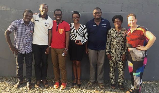 A group photograph of outgoing and incoming executives