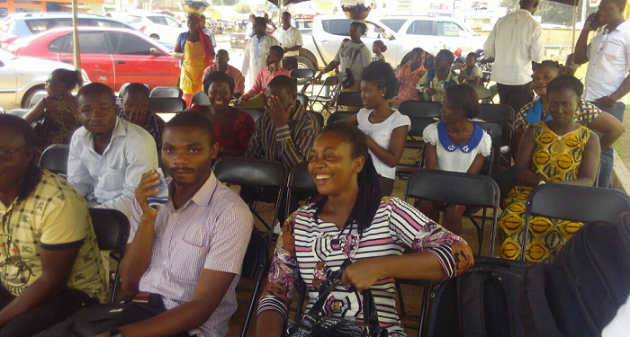 Some customers of DKM waiting at the main branch of GCB to be paid their deposits 