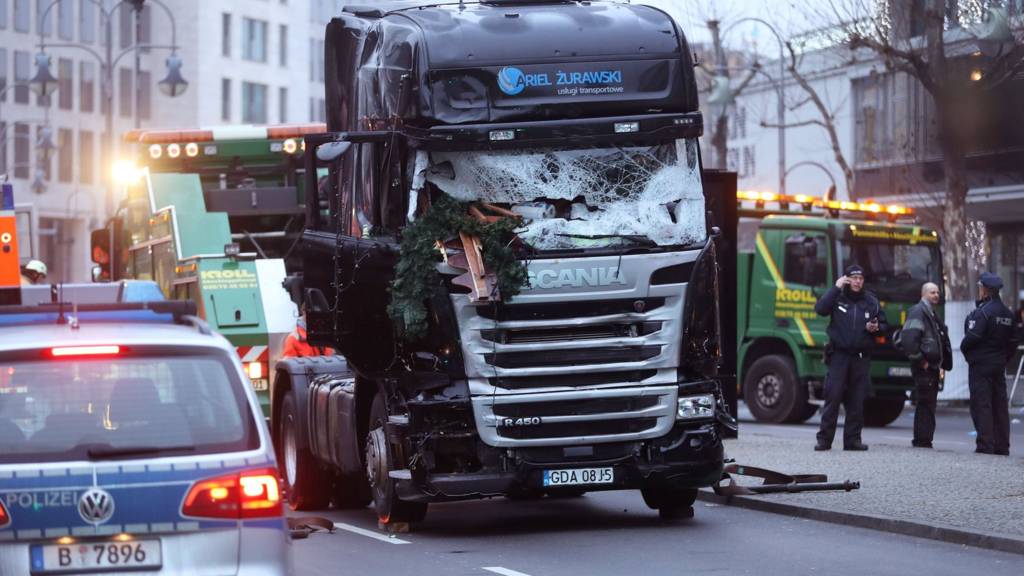 Berlin attack: Police hunt Tunisian suspect after finding ID papers in truck