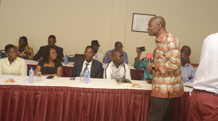 Dr Yaw Osei-Owusu (standing), the Chairman of Advocacy for Biodiversity Offsetting in Ghana (ABOG), speaking to some journalists during the  Environmental Protection Agency(EPA) validation meeting in Accra. Picture: EMMANUEL QUAYE