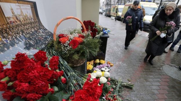 Flowers are laid at the home of the Alexandrov Ensemble in Moscow