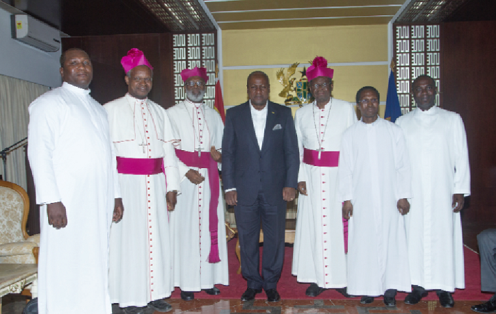 President Mahama (middle) with members of the delegation.