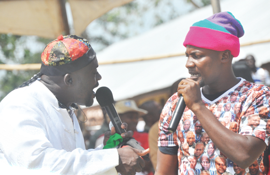 “Chineseman” in his element as his cohort Efo, explains it in Twi to the teeming NDC supporters