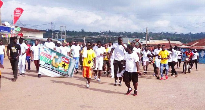 Some of the Machomen walking through some of the principal streets of Konongo