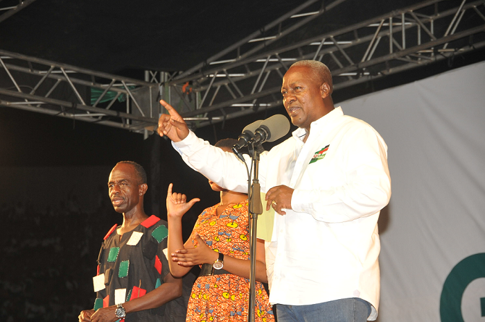 Prez.  Mahama addressing the larg mammoth of NDC faithful at the Stadium. With him on stage is the general secretary of the NDC, Mr Johnson Asiedu Nketia
