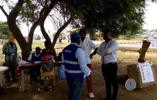 Mr Sylvester Tetteh, the NPP parliamentary candidate for Ningo-Prampram on a monitoring visit to the Dzidas Cinema Hall 2B polling station at Old Ningo.