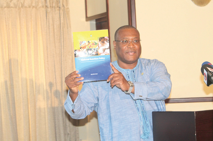 Mr Alexander Segbefia, the Minister of Health, launching the National Nutrition Policy at the ceremony. Picture: EDNA ADU-SERWAA