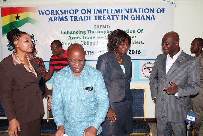 Mr Daniel Andoh (right), Managing Partner at CICADA, in an interaction with Mrs Margaret Akakpo (2nd right), Research Assistant on Conflict Management Programme at KAIPTC. Also in the photograph are Mr Ken Kinney (2nd left), President of WAANSA-GHANA and Dr Ayo Ayoola-Amale (left), President of Women's International League for Peace and Freedom. PICTURE: MAXWELL OCLOO