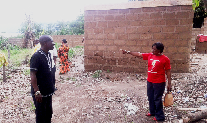 Madam Veronica Antwi-Adjei (right) unhappy about the situation at the Lake Bosomtwe