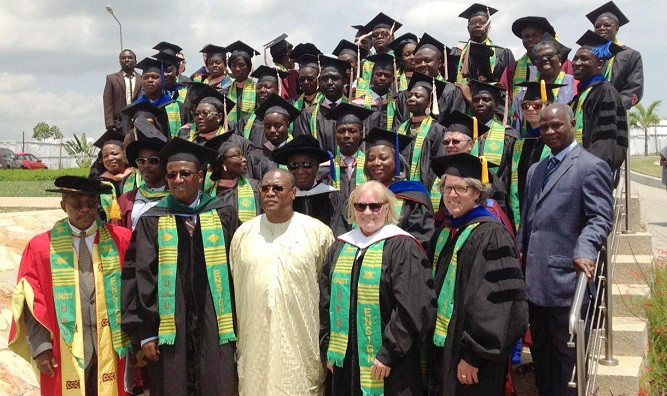 The Minister of Health, Mr Alex Segbefia (3rd from left, front row) with the board members, faculty and graduates. Also in the picture is Prof. Tsiri Agbenyega (extreme left, front row), Provost, College of Health Science, KNUST