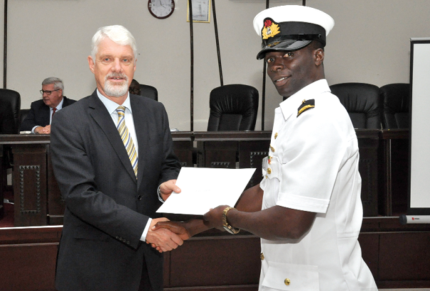 Mr Hanna handing over a certificate to one of the participants 