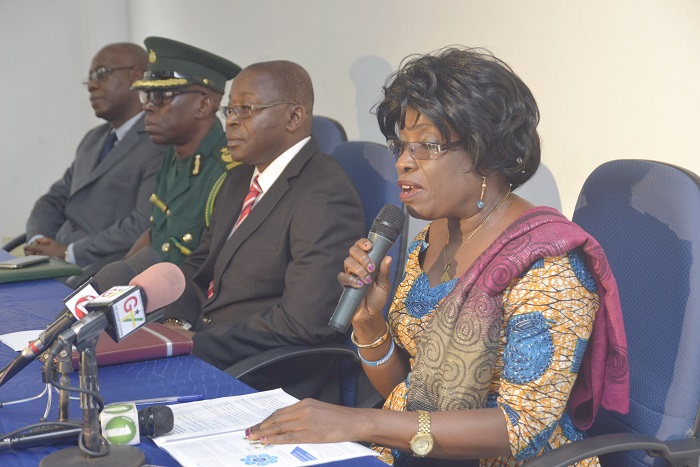 Miss Victoria Natsu delivering the keynote address at the workshop in Accra On her right are ACP Denis Akobdem Abode and Mr Bonaventure Agortimevor, acting  Deputy Director of Operations,  Ghana Immigration Service.  Picture: Emmanuel Quaye 