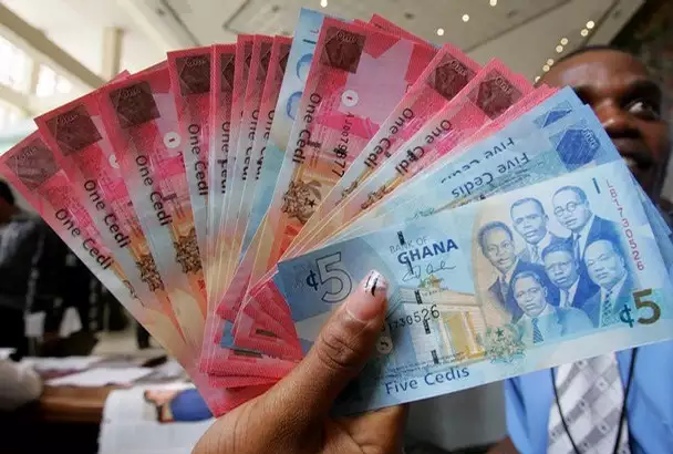 Adjoa will pay two cedis interest over the 12 months period if all conditions stayed the same, and assuming she took the loan at a fixed rate of interest. 