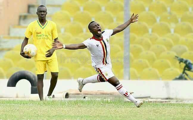 Patrick Razak races away in delight after scoring Hearts' equaliser