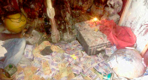 Imagery of their shrines or blood-spattered cash.