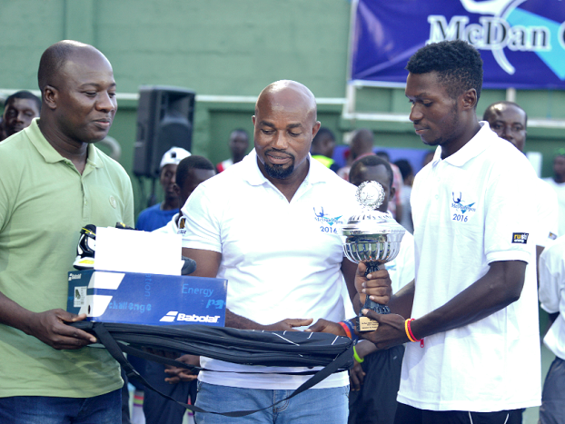 Michael Moses receiving the winner’s prize from Daniel McKorley (middle) and Mahama Ayariga, the Minister of Science and Environment Picture: EMMANUEL QUAYE
