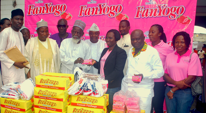 Ms Gifty Adjei-Fianko presenting the items to Sheikh Osman Nuhu Sharubutu, the National Chief Imam