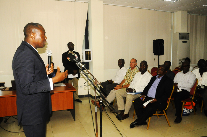  Mr Theophilus Ahwireng (left), the  Chief Executive Officer of the Petroleum Commission, addressing the media and some stakeholders at a forum in Accra Picture: GABRIEL AHIABOR