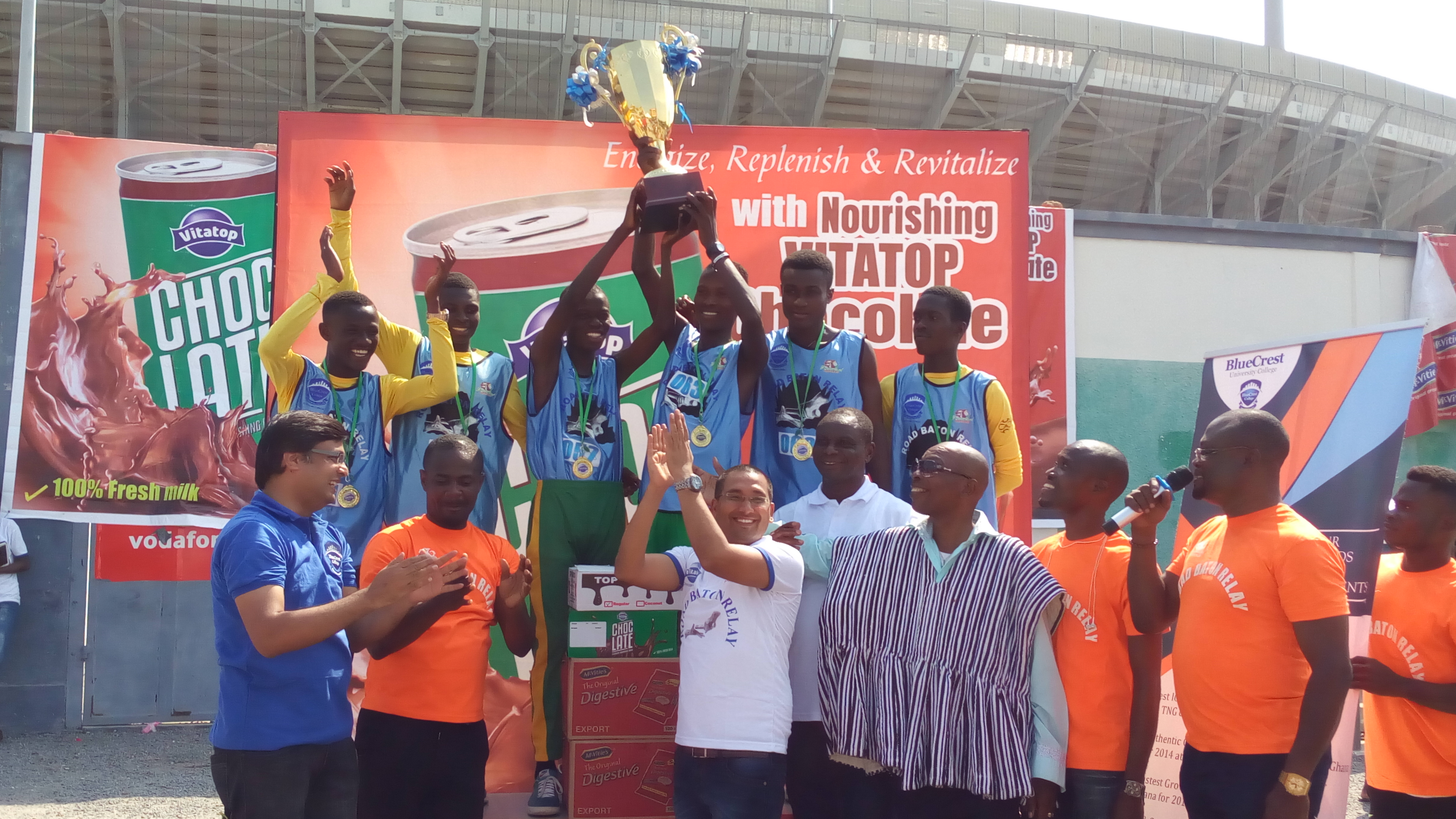 Nationwide Road Baton Relay boys winners, Swedru Business School holding their trophy aloft.