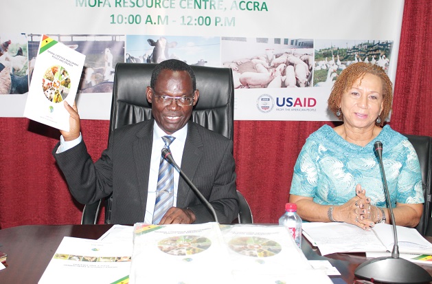 Mr Benjamin Gyasi (left) Director of Finance and Adminstration, Ministry of Food and Agriculture launching the Livestock Policy. Picture: Maxwell Ocloo