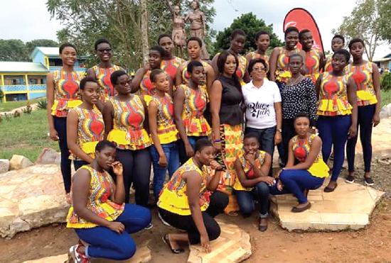 Ms Amoah (second row middle) with some teachers and students of MEGHIS
