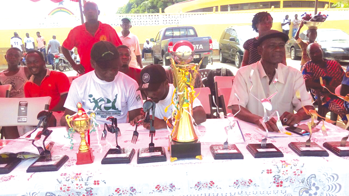  Mr Paul Atchoe (right) and Johnson Ablorde (left), Chairman of  Volta Region volleyball, at the high table