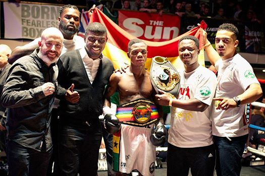 Duke Micah and team with the belt