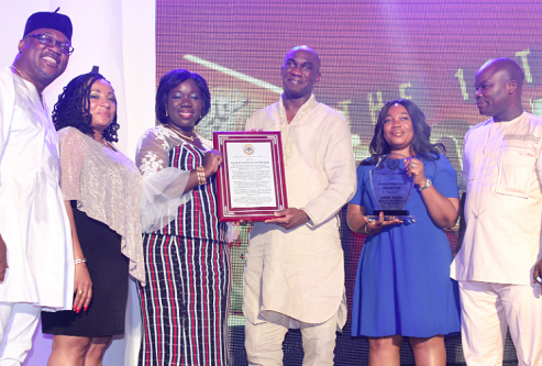 The Minister for MOTCCA, Elizabeth Ofosu-Adjare (3rd left) presenting the award for the Tourism Personality of the year to Kwame Ansong, CEO of Sunseekers Tours