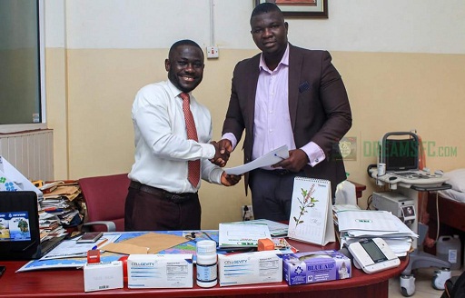 Ameenu Shardow (right) in a handshake with Dr Philemon Mensah after signing the contract last Friday