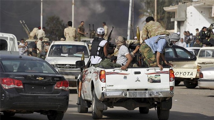 Rival militias clash in southern Sabha city in this March 2012 file photo [Reuters]