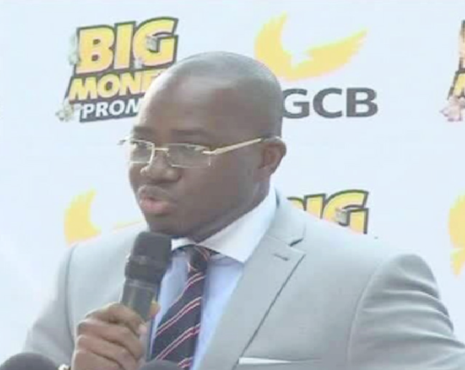 Ekow Incoom, Head of Business Promotions, NLA officiating GCB Bank’s Big Money Promotion.