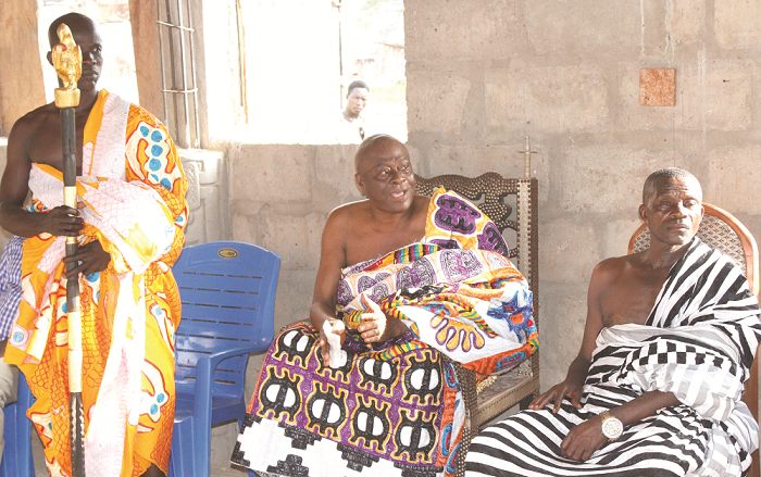  Nana Yao Ntadu III (middle) assuring party officials of  the NDP of victory in the 2016 election. With him are Okyeame Ackaah (left) and Nana  Gyasehene Awuah Dome