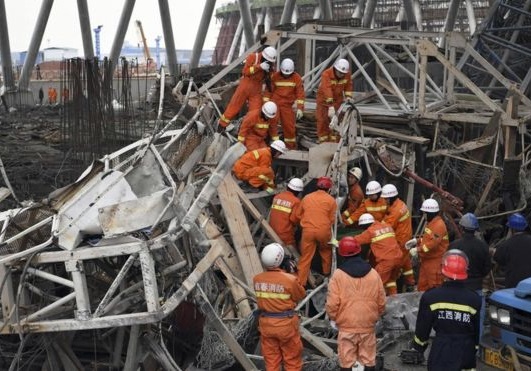 Xinhua said the death toll was likely to rise because an unknown number of people were still trapped in the debris