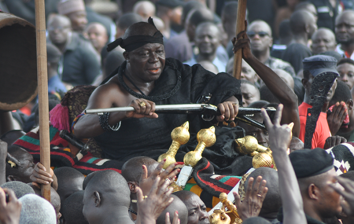 Dressed in pitch black cloth with a black head band and holding a single barrelled gun, the Asantehene, Otumfuo Osei Tutu II in a sorrowful mood rode in a palanquin to the grounds where a one week funeral rites was held for his biological mother and Queen mother of Asanteman, the Late Nana Afia Kobi Serwaa Ampem II