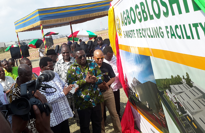  Nii Afotey Agbo (middle) admiring an artist’s impression of the plant. Those with him are Mr Alfred Oko Vandapuje, Mr Gavor and Mr John A. Pwamang