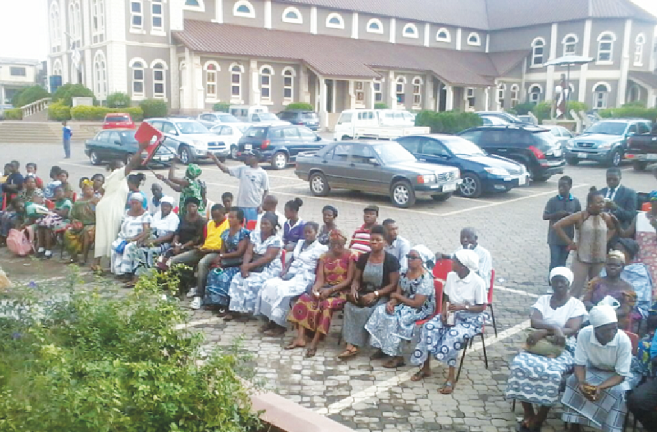  A line-up of people waiting for their turn at the eye clinic
