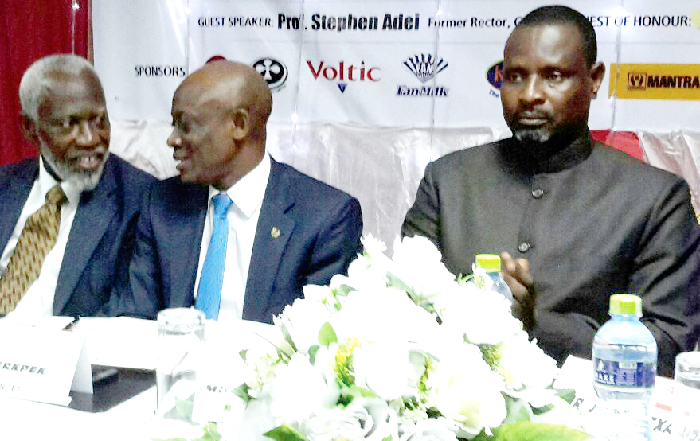 Mr Seth Terkper (middle) in a discussion with Prof. Stephen Adei former rector, GIMPA. On the right is Mr James Asare-Adjei, the AGI president at the 5th Annual General Meeting of the AGI in Kumasi
