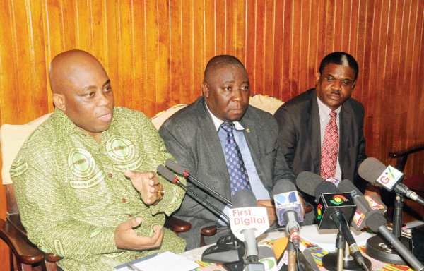 Dr Victor Asare Bampoe (left), addressing the press conference in Accra. Those with him are Dr Badu Sarkodie, (middle), and Dr Owen Laws Kaluwa (right)