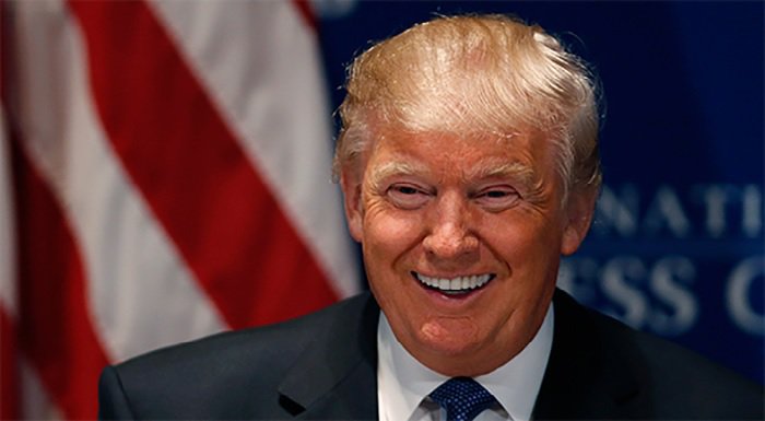 Donald Trump has announced he will be leaving his business "in total"