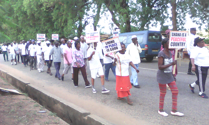  Members of the Legends Club marching through the streets of Wa
