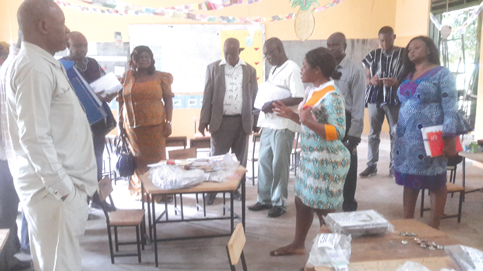 Ms Bibi Charrald (right), a trainer of trainers taking some of the participants through the preparation of local teaching and learning materials