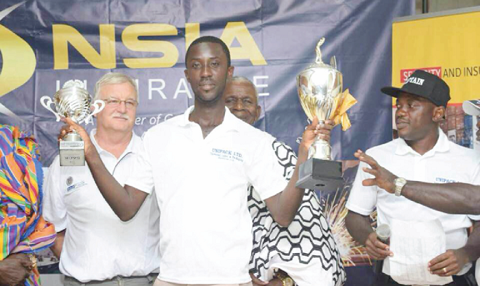  Maxwell Osei Bonsu displaying his trophies