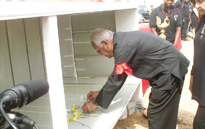 FLASHBACK: The Chairman of the Melcom Group, Mr Bhagwan Khubchandani, laying a wreath in memory of those who died in the disaster
