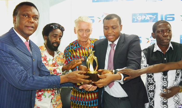  Rev. Prof. Emmanuel Narsh (2nd right), Apostle Dr Jackson Owusu (left) and Zimran Randolph Clottey (2nd left) unveiling the GPA awards. Picture: PATRICK DICKSON   