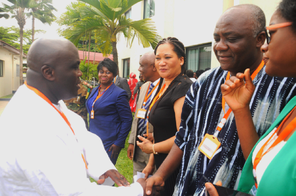  Mr Julius Debrah interacting with  participants during the seminar