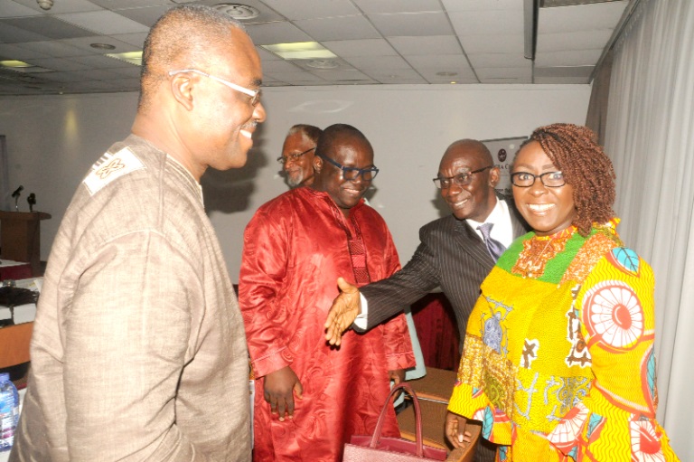 Mrs Dzifa Gomashi (right), Mr Akunu Dake (left), Mr Kenneth Ashigbey (2nd left), and Mr Elliot Agyare (2rd right) interacting at the meeting. 