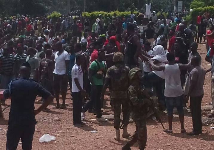 Some soldiers trying to maintain law and order