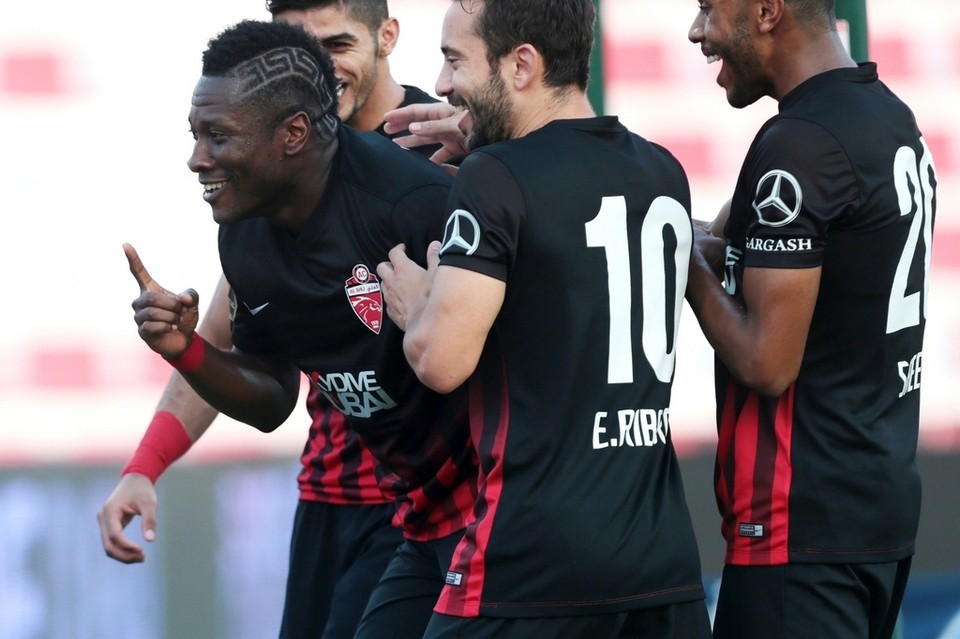 Gyan celebrating his strike