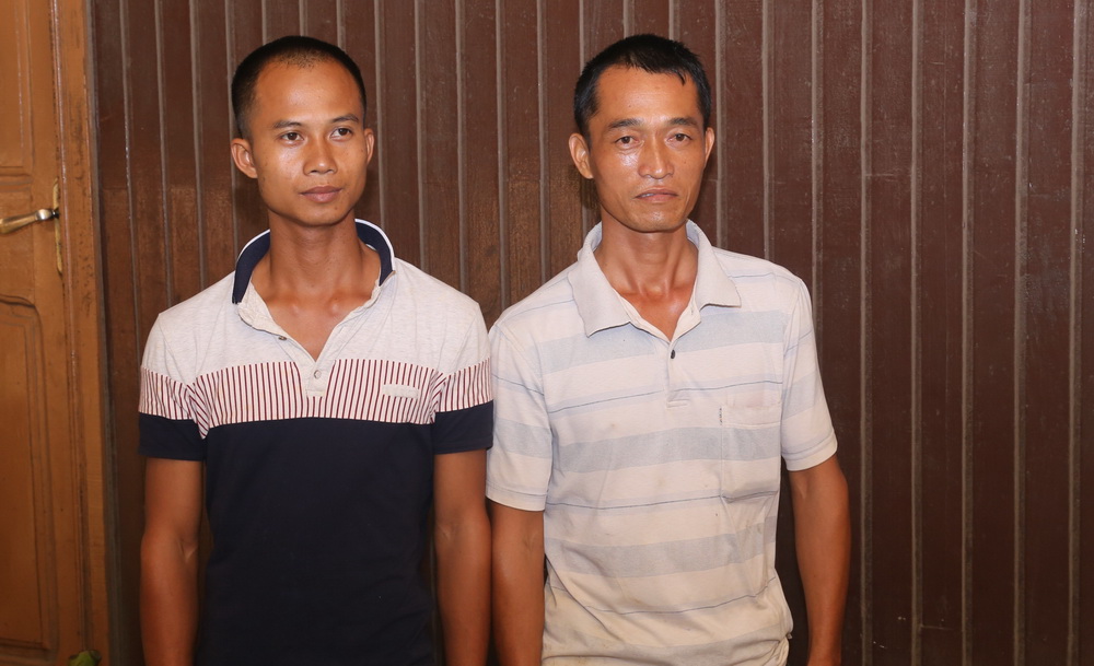 Li Wen Qieng, 28 (left) and Mo Sin Shan, 35, after their arrest for their involvement in galamsey operations on Cocoa Board land at Wassa Akropong. Picture: SAMUEL TEI ADANO